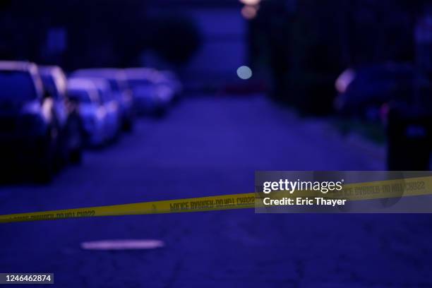 Tape cordons off the scene of a deadly shooting on January 22, 2023 in Monterey Park, California. 10 people were killed and 10 more were injured at a...