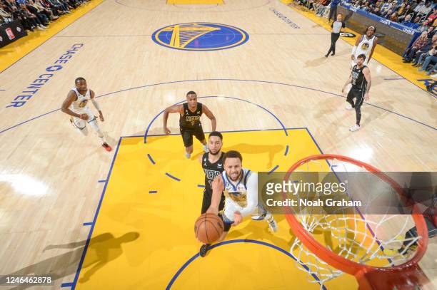 Stephen Curry of the Golden State Warriors drives to the basket during the game against the Brooklyn Nets on January 22, 2023 at Chase Center in San...