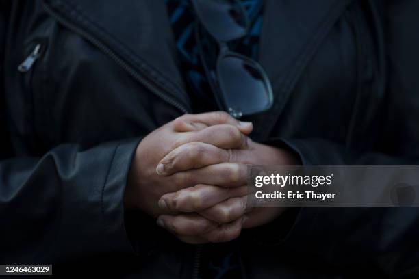 Members of the community hold a prayer vigil at Monterey Park City Hall for victims of a deadly shooting on January 22, 2023 in Monterey Park,...