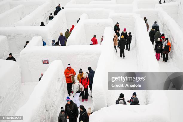 People are seen in Snowlandia Winter Theme Park's labyrinth as they try to find the way out in Zakopane, Poland on January 21, 2023. Established...