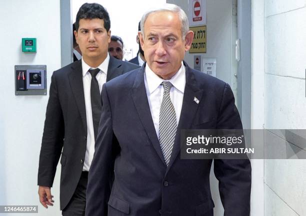 Israeli Prime Minister Benjamin Netanyahu arrives for a hearing at the Magistrate's Court in Rishon Lezion on January 23, 2023. - The Netanyahus were...