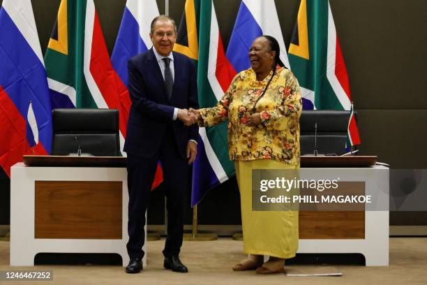 Russian Minister of Foreign Affairs of Sergei Lavrov shakes hands with South African Minister of International Relations and Cooperation Naledi...