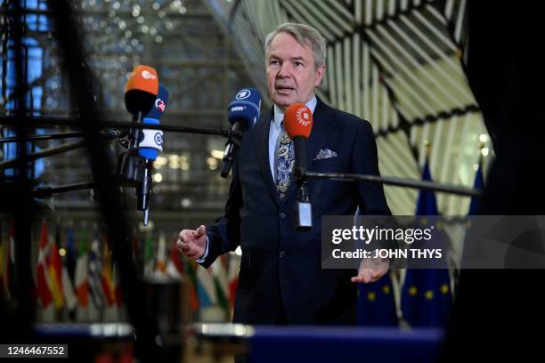 Finnish foreign minister Pekka Haavisto talks to the press during an EU foreign ministers meeting in Brussels on January 23, 2023.