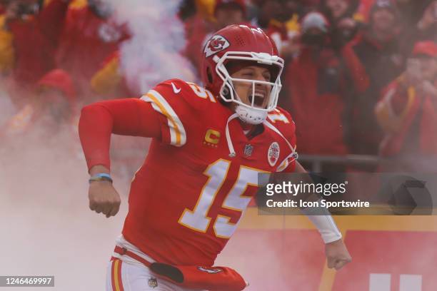 Kansas City Chiefs quarterback Patrick Mahomes flexes as smokes rises around him before an AFC divisional playoff game between the Jacksonville...