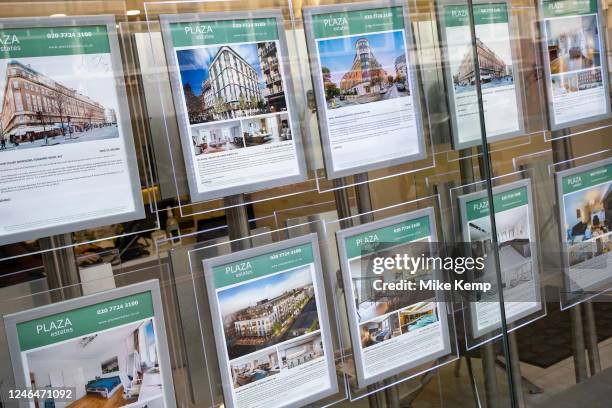 Exclusive homes for sale in an estate agents window on Edgware Road on 9th January 2023 in London, United Kingdom. Housing in London is a very...