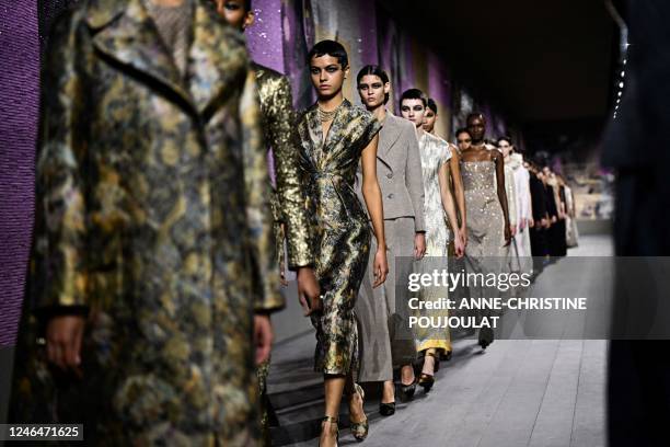 Models parade at the end of Christian Dior show during the Haute-Couture Spring-Summer 2023 Fashion Week in Paris on January 23, 2023.