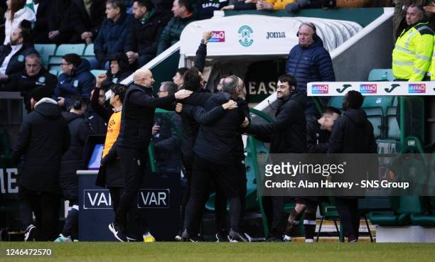 Lee McCulloch and the Hearts coaching staff celebrate during a Scottish Cup Fourth Round match between Hibernian and Heart of Midlothian at Easter...