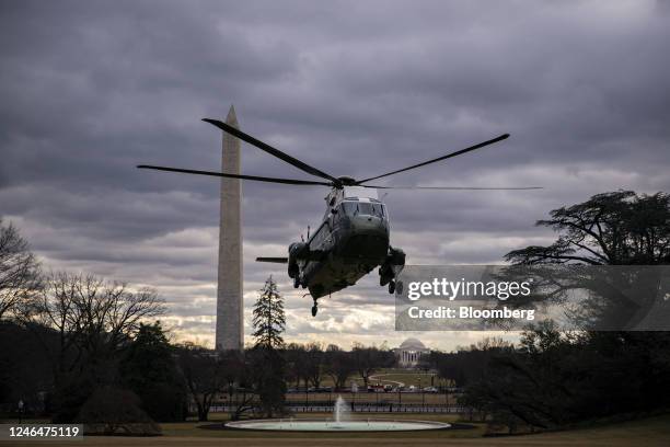 Marine One, with US President Joe Biden on board, arrives on the South Lawn of the White House in Washington, DC, US, on Monday, Jan. 23, 2023. The...