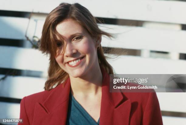 Portrait of American actress Carrie Fisher as she poses outdoors, 1980.