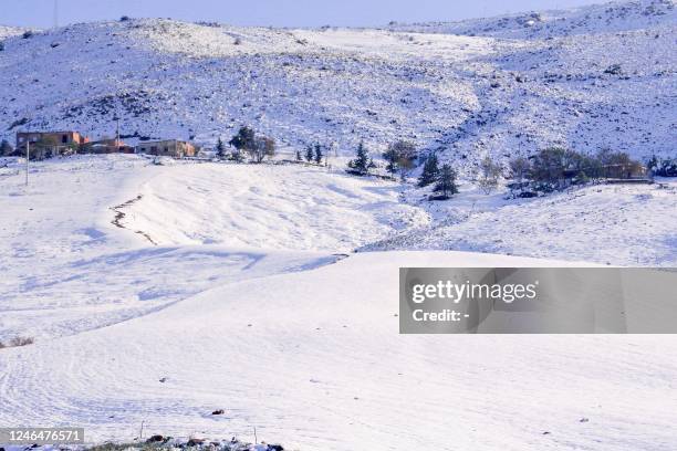 Snow covers the land in Algeria's Constantine province, 400Km east of the capital, on January 23, 2023.