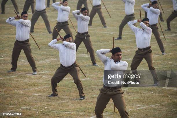 Volunteers of the Hindu nationalist organisation Rashtriya Swayamsevak Sangh take part in a physical exercise drill during a rally to commemorate the...