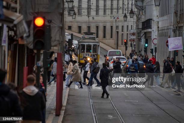 Several people are seen walking in one of the streets in the Baixa sector, in the surroundings of Praca de Comercio. Lisbon, January 16, 2023. The...