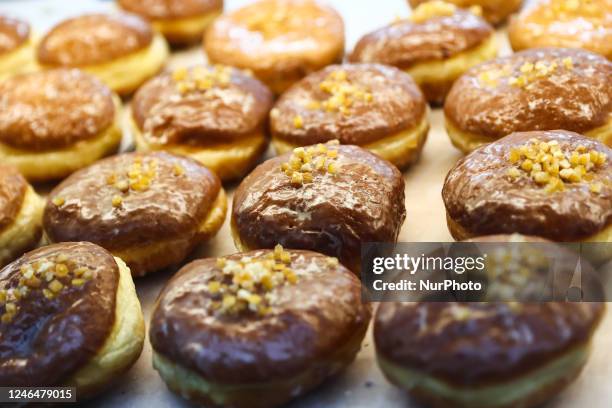 Traditional polish donuts called Paczki are seen in at a store in Krakow, Poland on January 23, 2023.