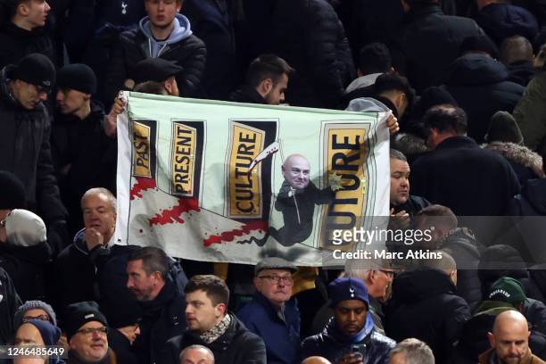 Tottenham Hotspur fans hold a banner in protest of Chairman Daniel Levy during the Premier League match between Fulham FC and Tottenham Hotspur at...