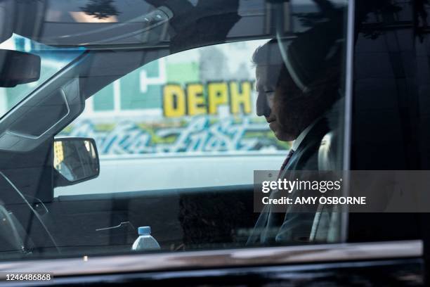 Alex Spiro, one of Elon Musk's defense attorneys, is seen in a car as he leaves the Phillip Burton Federal Building and US Courthouse in San...