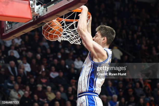 Center Kyle Filipowski of the Duke Blue Devils dunks against the Virginia Tech Hokies in the first half during a game at Cassell Coliseum on January...