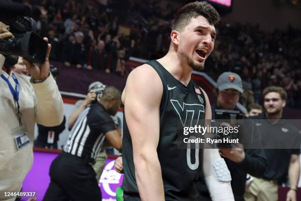 Guard Hunter Cattoor of the Virginia Tech Hokies celebrates following a win against the Duke Blue Devils at Cassell Coliseum on January 23, 2023 in...