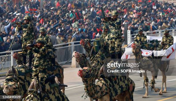 Indian Border Security Force Camel contingent marc at Kartvya Path during the full dress rehearsal for the upcoming Republic Day parade. India will...