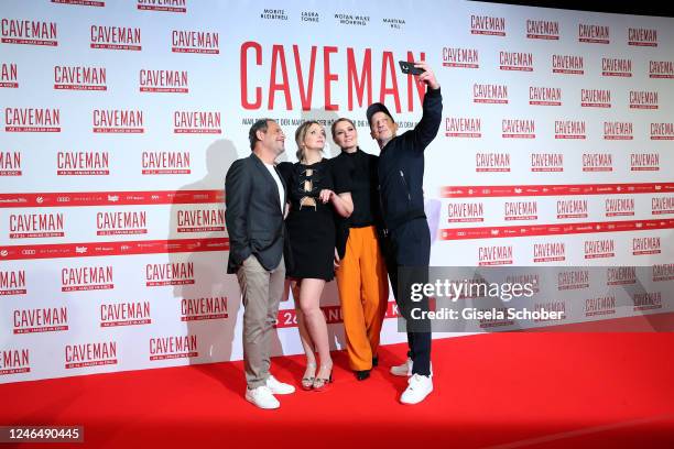 Moritz Bleibtreu, Laura Tonke, Alexandra Neldel and Wotan Wilke Möhring take a selfie during the premiere of the new Constantin Film movie "Caveman"...