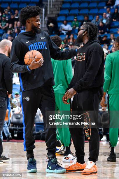 Jonathan Isaac of the Orlando Magic talks with Kevon Harris during the game against the Boston Celtics on January 23, 2023 at Amway Center in...