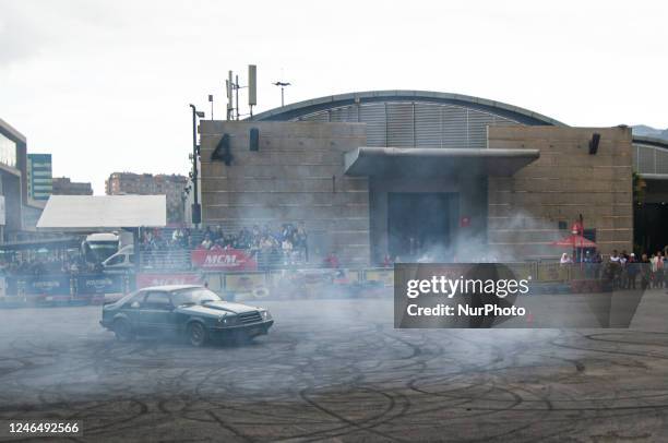 Ford Mustang performs a drift and burnout show during the MCM Car Show in Bogota, Colombia, the biggest auto show in latin america, on January 20,...