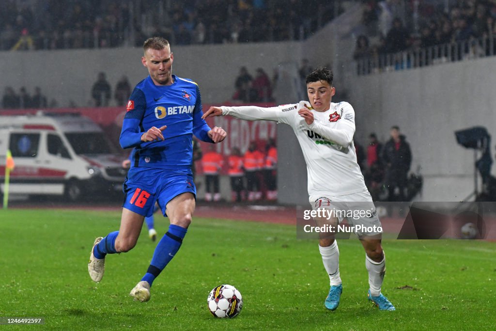 Joonas Tamm and Calin Popescu in action during Romania Superliga: News  Photo - Getty Images