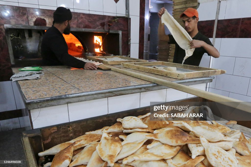 Pakistan Rafay Samoon Members of staff man the oven at a bakery for Samoon bread in... News ...
