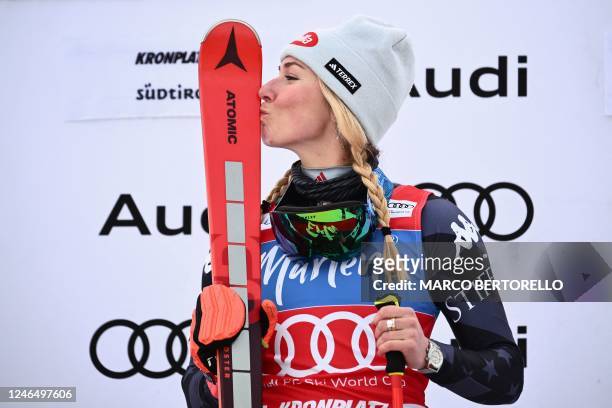 Race winner USA's Mikaela Shiffrin celebrates on the podium after competing in the Women's Giant Slalom on January 24, 2023 in Plan de Corones ,...