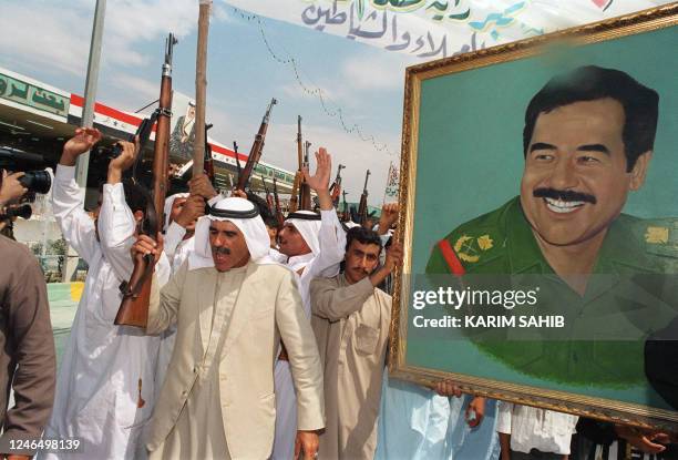 The people of Tikrit, 180 km north of Baghdad, celebrate the birthday of iraqi president Saddam Hussein, who was born in their town 28 april 1937....