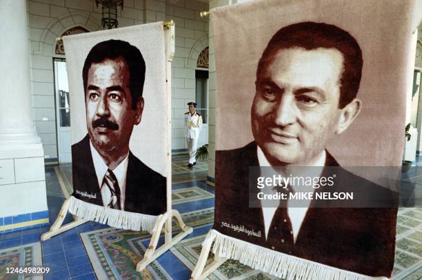 Effigies of Egyptian President Hosni Mubarak and Iraqi President Saddam Hussein are exposed, on June 15, 1989 during the opening of the Arab...
