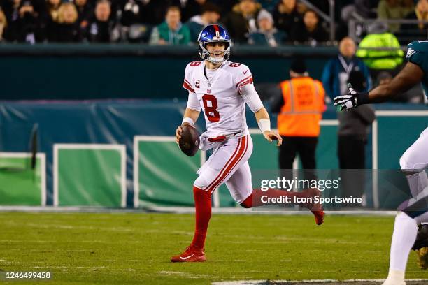New York Giants quarterback Daniel Jones rolls out during the NFC Divisional playoff game between the Philadelphia Eagles and the New York Giants on...