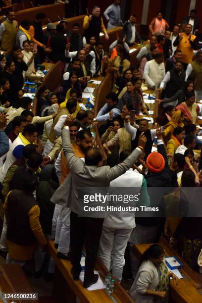 And AAP councillors protesting after the oath and before voting for Delhi Mayor elections of Municipal Corporation of Delhi, at Civic Centre, on...