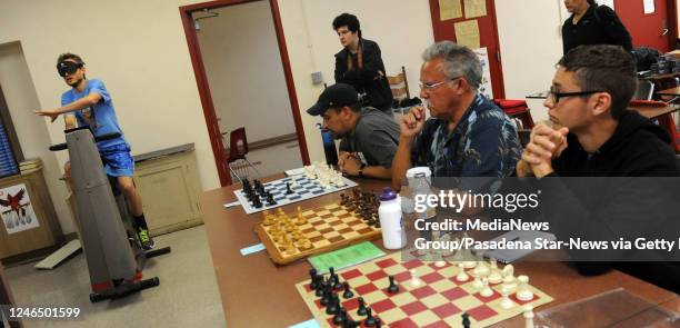 Chess grandmaster Timur Gareyev playing a 10 person blindfold