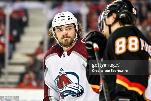 Colorado Avalanche Defenceman Samuel Girard looks at Calgary Flames Left Wing Andrew Mangiapane after a whistle during the first period of an NHL...