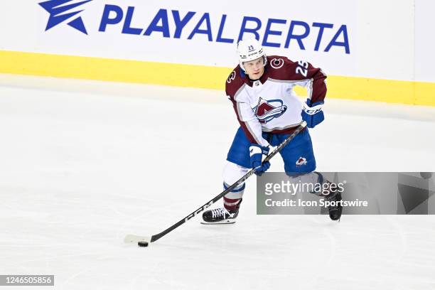 Colorado Avalanche Right Wing Logan O'Connor skates with the puck during the second period of an NHL game between the Calgary Flames and the Colorado...
