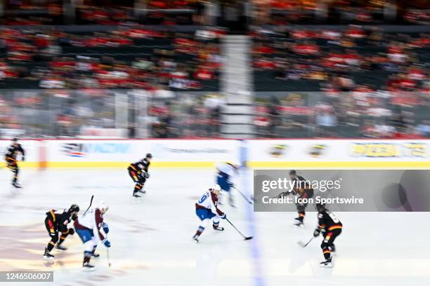 Colorado Avalanche Center Nathan MacKinnon skates with the puck during the second period of an NHL game between the Calgary Flames and the Colorado...