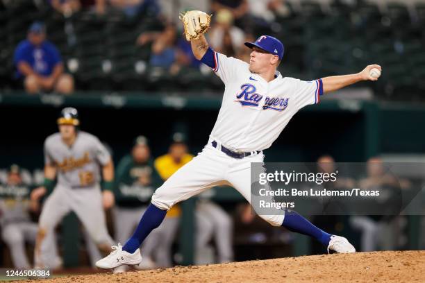 Kolby Allard of the Texas Rangers delivers a pitch during a game against the Oakland Athletics at Globe Life Field on July 12, 2022 in Arlington,...