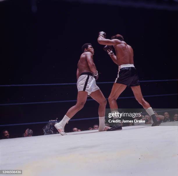 World Heavyweight Title: Muhammad Ali and Cleveland Williams exchange punches during fight at Houston Astrodome. Houston, TX CREDIT: James Drake