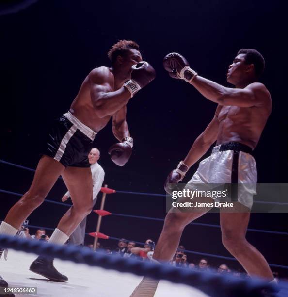 World Heavyweight Title: Muhammad Ali and Cleveland Williams exchange punches during fight at Houston Astrodome. Houston, TX CREDIT: James Drake