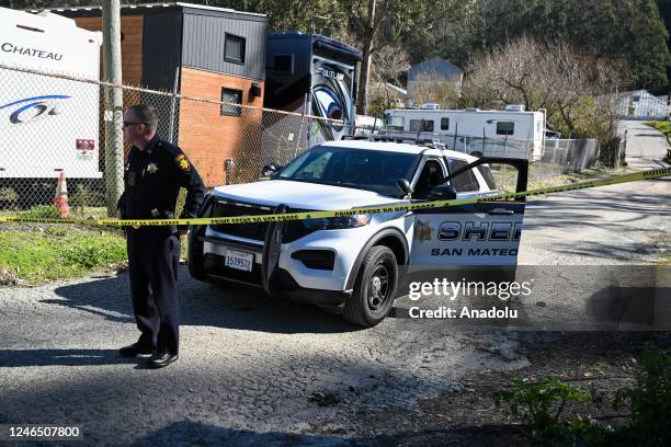 Police cordon off the crime scene of a mass shooting that left seven people dead and one injured on Monday, in Half Moon Bay, California, United...