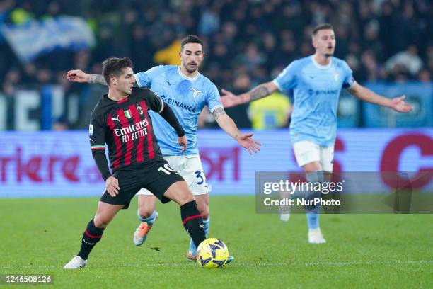 Brahim Diaz of AC Milan and Danilo Cataldi of SS Lazio compete for the ball during the Serie A match between SS Lazio and AC Milan at Stadio...