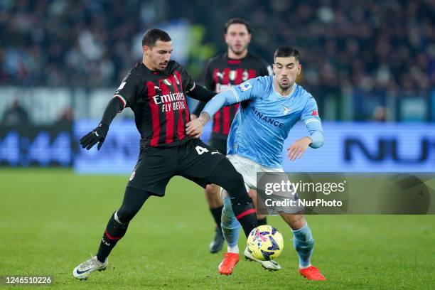 Mattia Zaccagni of SS Lazio and Ismael Bennacer of AC Milan compete for the ball during the Serie A match between SS Lazio and AC Milan at Stadio...