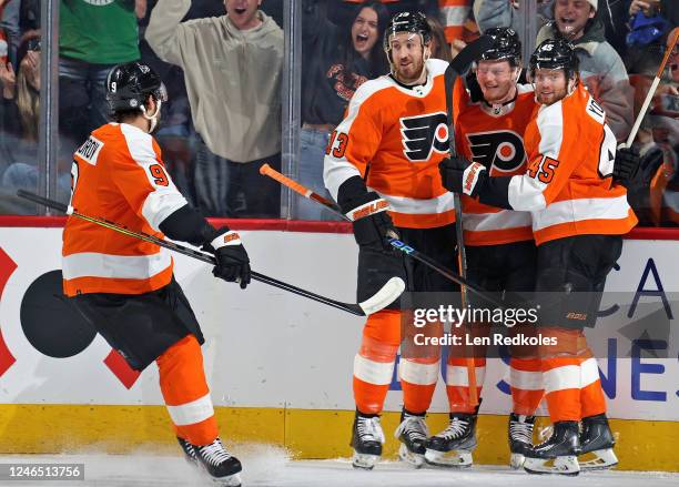 Wade Allison of the Philadelphia Flyers celebrates his first period goal against the Los Angeles Kings with Ivan Provorov, Kevin Hayes, and Cam York...