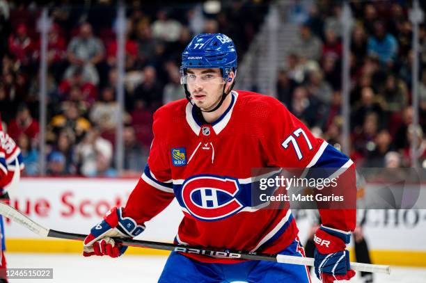 Kirby Dach of the Montreal Canadiens prepares for a face-off during the first period of the NHL regular season game between the Montreal Canadiens...