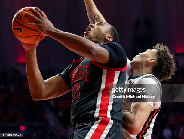 Zed Key of the Ohio State Buckeyes shoots the ball against Coleman Hawkins of the Illinois Fighting Illini during the second half at State Farm...