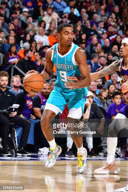 Theo Maledon of the Charlotte Hornets dribbles the ball during the game against the Phoenix Suns on January 24, 2023 at Footprint Center in Phoenix,...