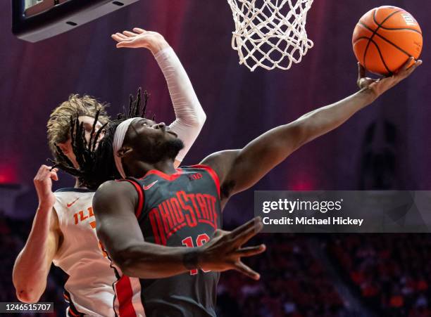 Isaac Likekele of the Ohio State Buckeyes shoots the ball against Matthew Mayer of the Illinois Fighting Illini during the second half of the game at...