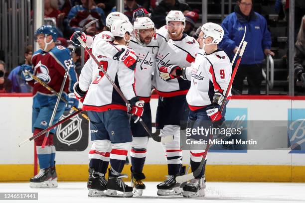 Nick Jensen, Dylan Strome, Alex Ovechkin, Anthony Mantha and Dmitry Orlov of the Washington Capitals celebrate a goal against the Colorado Avalanche...