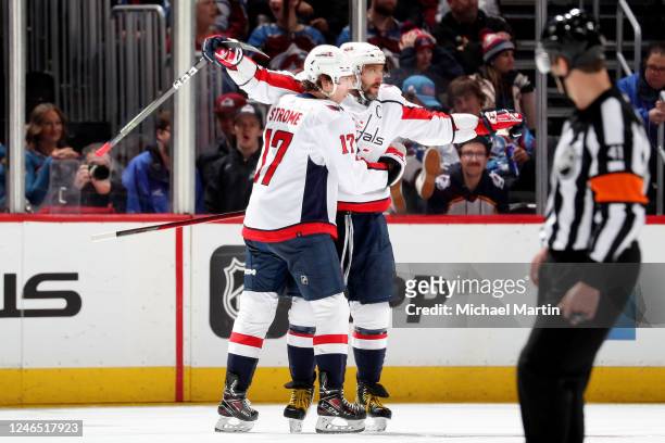Dylan Strome and Alex Ovechkin of the Washington Capitals celebrate a goal against the Colorado Avalanche at Ball Arena on January 24, 2023 in...