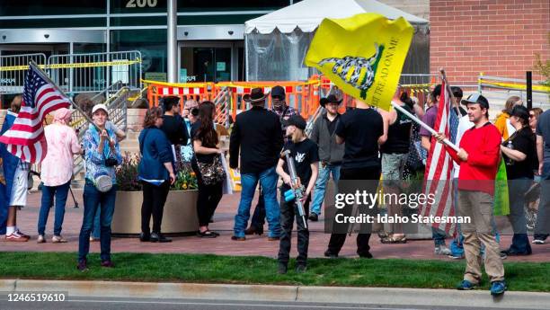 Supporters of Ammon Bundy gather in front of the Ada County Courthouse in April 2021 to protest Idaho Gov. Brad Littleâs handling of the coronavirus...